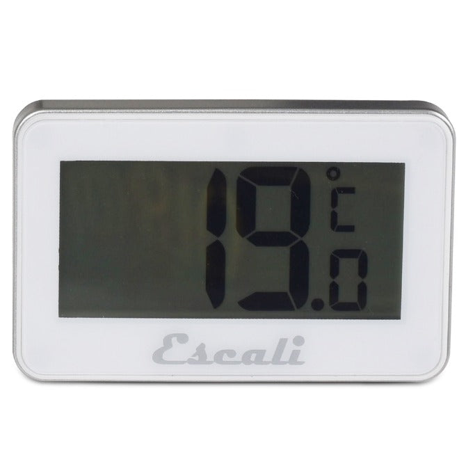 A digital refrigerator/freezer thermometer with a white casing and a digital screen displaying the temperature in both Fahrenheit and Celsius scales. The brand 'Escali' is visible on the device.