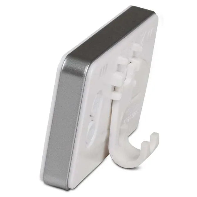 A digital refrigerator/freezer thermometer with a white casing and a digital screen displaying the temperature in both Fahrenheit and Celsius scales. The brand 'Escali' is visible on the device.